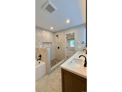 Beautifully renovated ranch offering modern style, comfort, and - photo 17