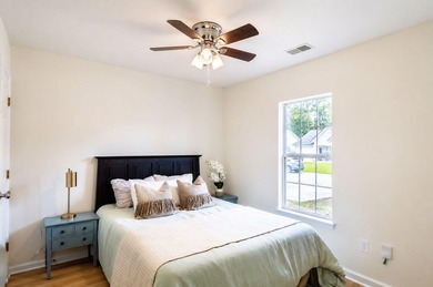 UPDATED PHOTOS! This adorable garden home has been completely - photo 11
