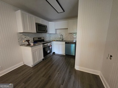THIS PROPERTY IS ZONED MULTI-FAMILY AND CONTAINS 7 BUILDINGS - photo 11