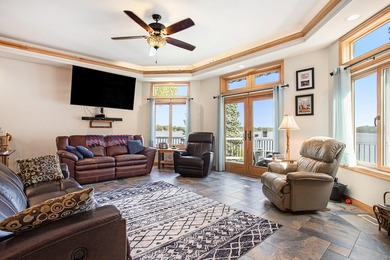 Discover luxury lakeside living in this custom-built 3-bedroom - photo 11