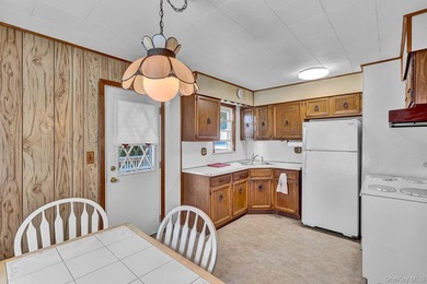 Charming 4-bedroom, 1-bath Cape located mid-block on a quiet - photo 11