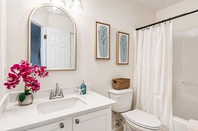 UPDATED PHOTOS! This adorable garden home has been completely - photo 13