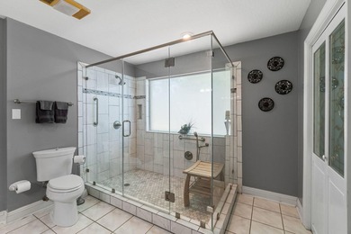 Enjoy morning coffee in your sunroom overlooking the private - photo 13