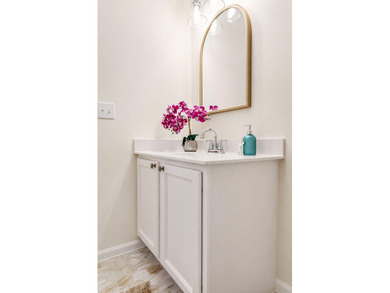 UPDATED PHOTOS! This adorable garden home has been completely - photo 14