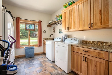 Discover luxury lakeside living in this custom-built 3-bedroom - photo 14