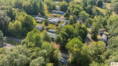 Large shop on site and adjacent urestricted lot with water and - photo 15
