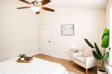 UPDATED PHOTOS! This adorable garden home has been completely - photo 16