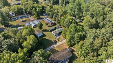 Large shop on site and adjacent urestricted lot with water and - photo 17