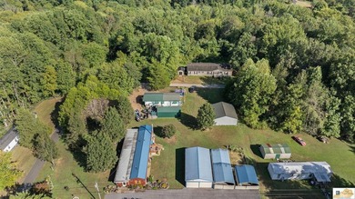 Large shop on site and adjacent urestricted lot with water and - photo 18