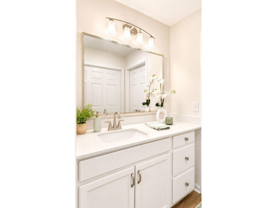 UPDATED PHOTOS! This adorable garden home has been completely - photo 19