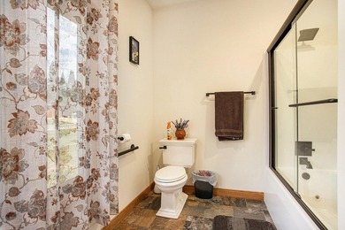 Discover luxury lakeside living in this custom-built 3-bedroom - photo 19