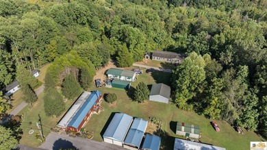 Large shop on site and adjacent urestricted lot with water and - photo 19
