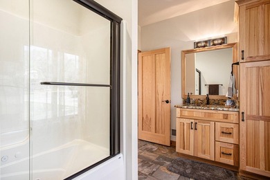 Discover luxury lakeside living in this custom-built 3-bedroom - photo 20