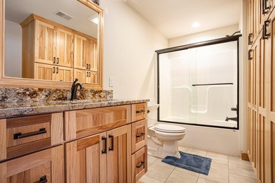 Discover luxury lakeside living in this custom-built 3-bedroom - photo 26