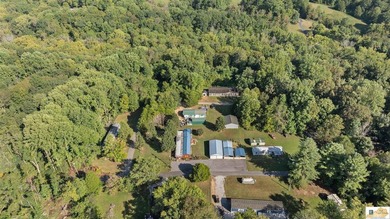 Large shop on site and adjacent urestricted lot with water and - photo 29