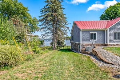 Discover luxury lakeside living in this custom-built 3-bedroom - photo 32