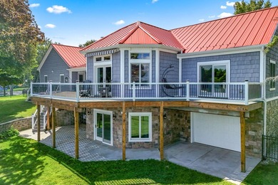 Discover luxury lakeside living in this custom-built 3-bedroom - photo 39