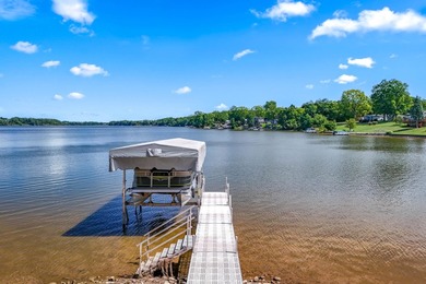 Discover luxury lakeside living in this custom-built 3-bedroom - photo 40