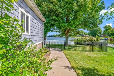 Discover luxury lakeside living in this custom-built 3-bedroom - photo 45