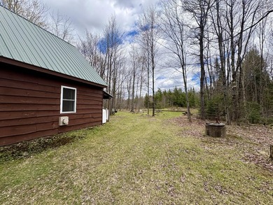 Tucked away at the end of a dead-end road, this off-grid camp - photo 12