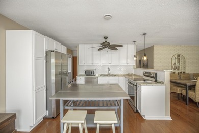 This charming five-bedroom, two-bath and thoroughly updated home - photo 12