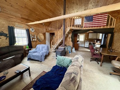 Tucked away at the end of a dead-end road, this off-grid camp - photo 13