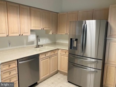 GREAT NEW PRICE on this freshly painted top floor unit with - photo 13