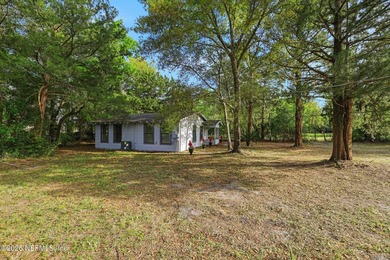 Charming Bungalow on 4.99 Acres on the Water Welcome to your - photo 34