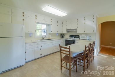 Situated along the shoreline of Badin Lake, this one-of-a-kind - photo 8