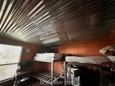 Come take a look at this waterfront lot. Has a small cabin - photo 14