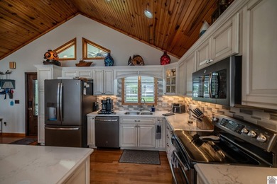 Everything you could ask for in a waterfront home! Newer covered - photo 14