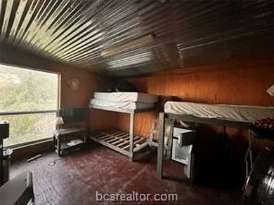 Come take a look at this waterfront lot. Has a small cabin - photo 15