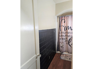 Bungalow style home on .5 acres in Saydel school system in NE