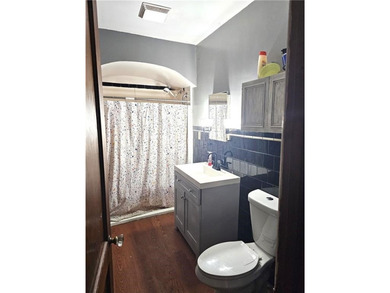 Bungalow style home on .5 acres in Saydel school system in NE