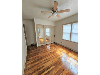 Bungalow style home on .5 acres in Saydel school system in NE