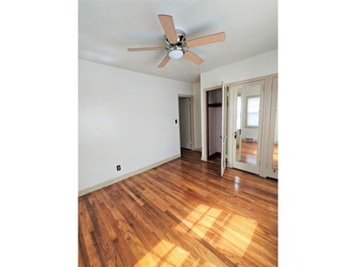 Bungalow style home on .5 acres in Saydel school system in NE