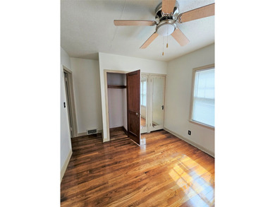 Bungalow style home on .5 acres in Saydel school system in NE