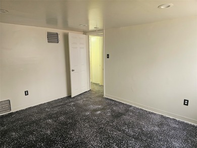 Bungalow style home on .5 acres in Saydel school system in NE