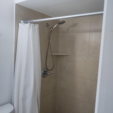 Welcome to this charming two-bedroom, two-bathroom condominium - photo 11