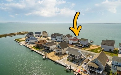 BAYFRONT! Gorgeous Direct Bayfront Home in Captain's Cove Golf & - photo 3