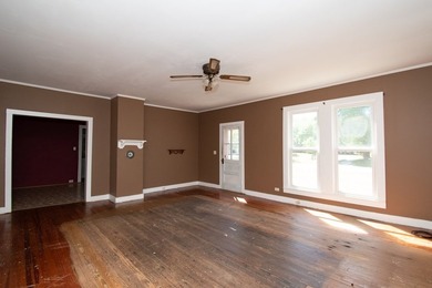 This 2-bedroom, 1-bath property in Painter, Virginia presents an - photo 6