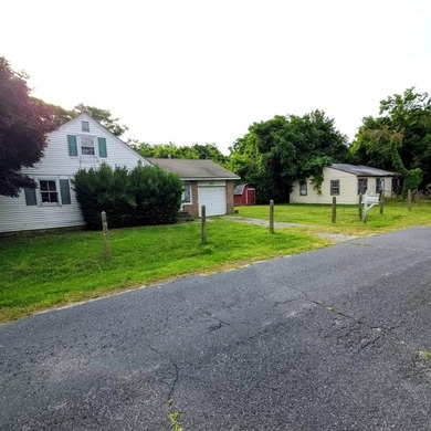 Two Homes, One Unique Opportunity! This rare property features - photo 1
