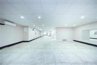 Rare-find ground floor commercial condo having Retail C of O is - photo 12