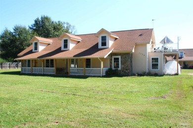 Lake Home For Sale in Molino, Florida