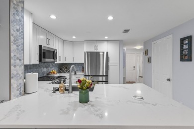 Welcome home to this beautifully remodeled 3-bedroom, 2.5-bath - photo 12
