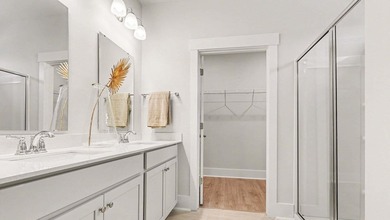 *4 bedrooms, 2.5 baths *Welcoming front porch and screened in - photo 24