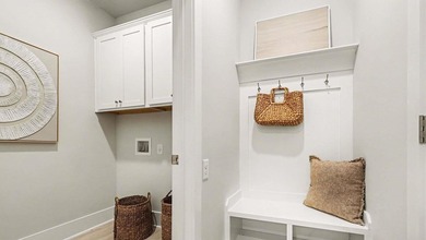 *4 bedrooms, 2.5 baths *Welcoming front porch and screened in - photo 27