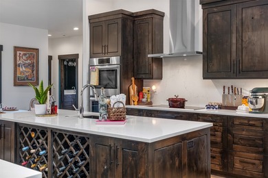 Set within the exclusive gated enclave of Cabernet Estates at - photo 6