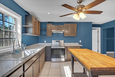 Situated on over a quarter-acre on a quiet dead-end street, this - photo 8