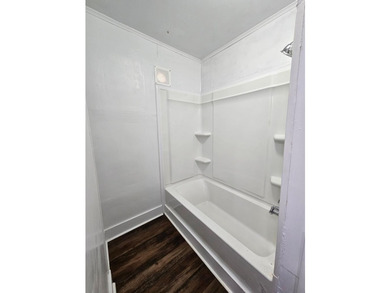 This charming, well-maintained duplex is ideally located in the - photo 8